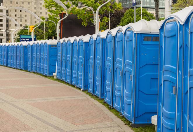 a row of sleek and modern portable restrooms at a special outdoor event in Capistrano Beach CA